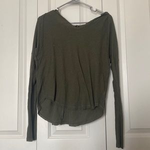 green hooded shirt
